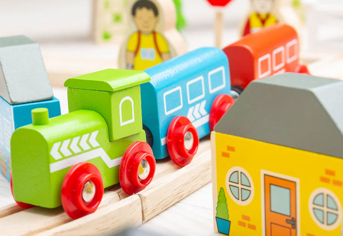 Close-up of wooden train track pieces